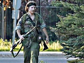 Manhunt after 3 police officer...